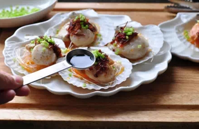 With XO sauce Scallop in Shell